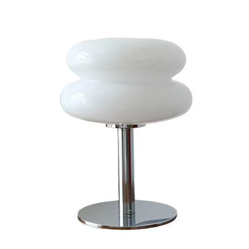 Handcrafted stained glass lamp featuring Art Deco and Mid Century design elements with silver base and ambient LED lighting