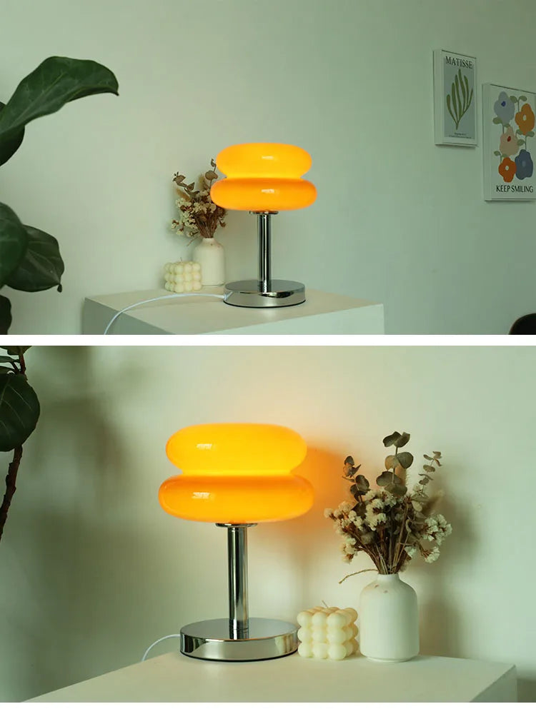 Handcrafted stained glass lamp featuring Art Deco and Mid Century design elements with silver base and ambient LED lighting