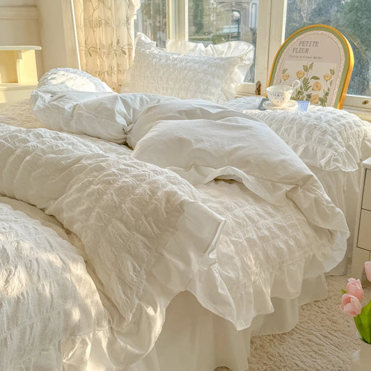 Elegant Mia Ruffle Duvet Set in soft microfibre twill with delicate embroidery and ruffle trim, available in Single, Double, and Queen sizes